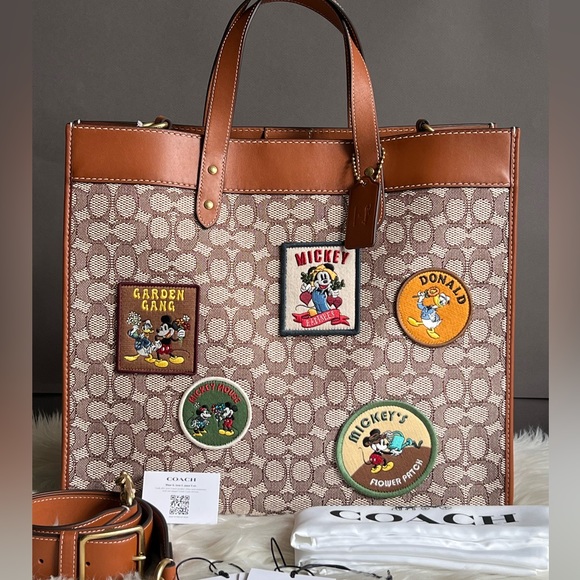 Coach Handbags - 💰SOLD - CG974 - Disney X Coach Field Tote 40 in Signature Textile Jacquard